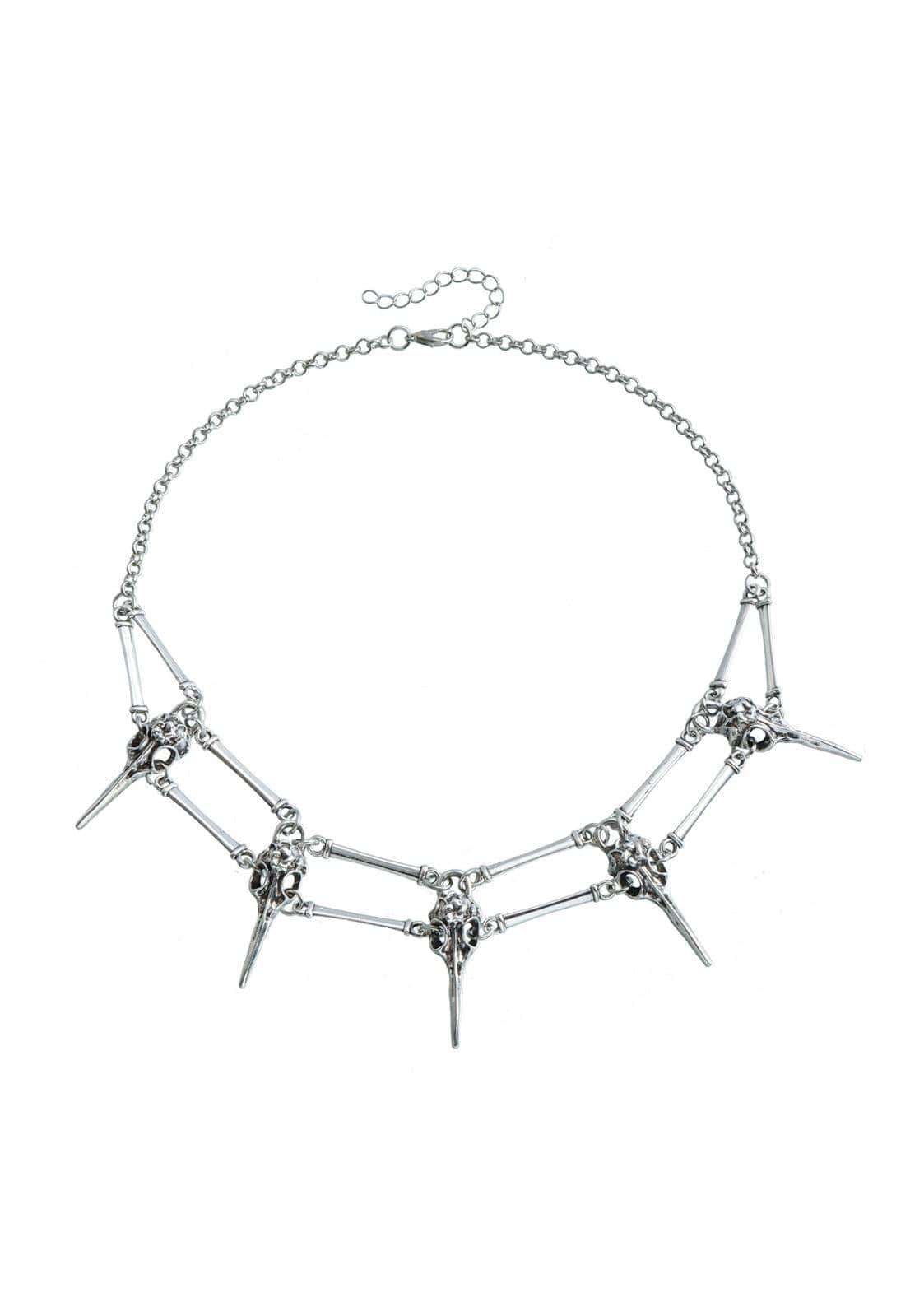 Silberne metallische choker halskette mit schädel offener mund und stacheln in dunkler ästhetik crow skulls chain