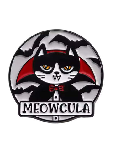 Meowcula gothic pin enameled with black and red vampire cat design silver accents bow tie and bats background