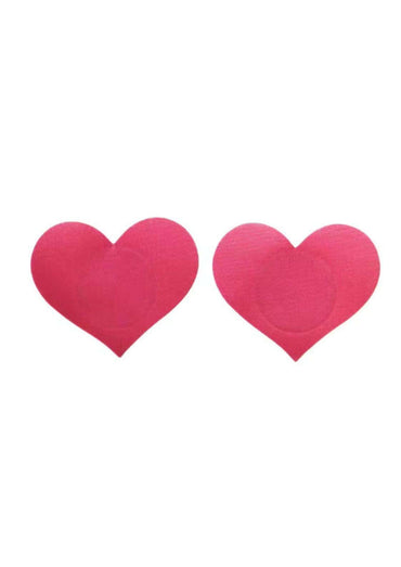 Paar leuchtend pinker herzförmiger haftbarer nippelpasties passend für gothic und dark fashion stil