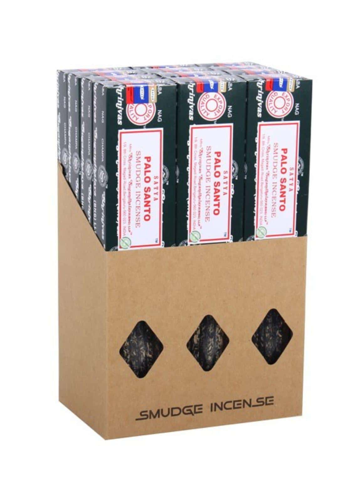 Eine schachtel palo santo smudge räucherstäbchen in schwarzer und roter verpackung ideal für meditation und yoga ritual