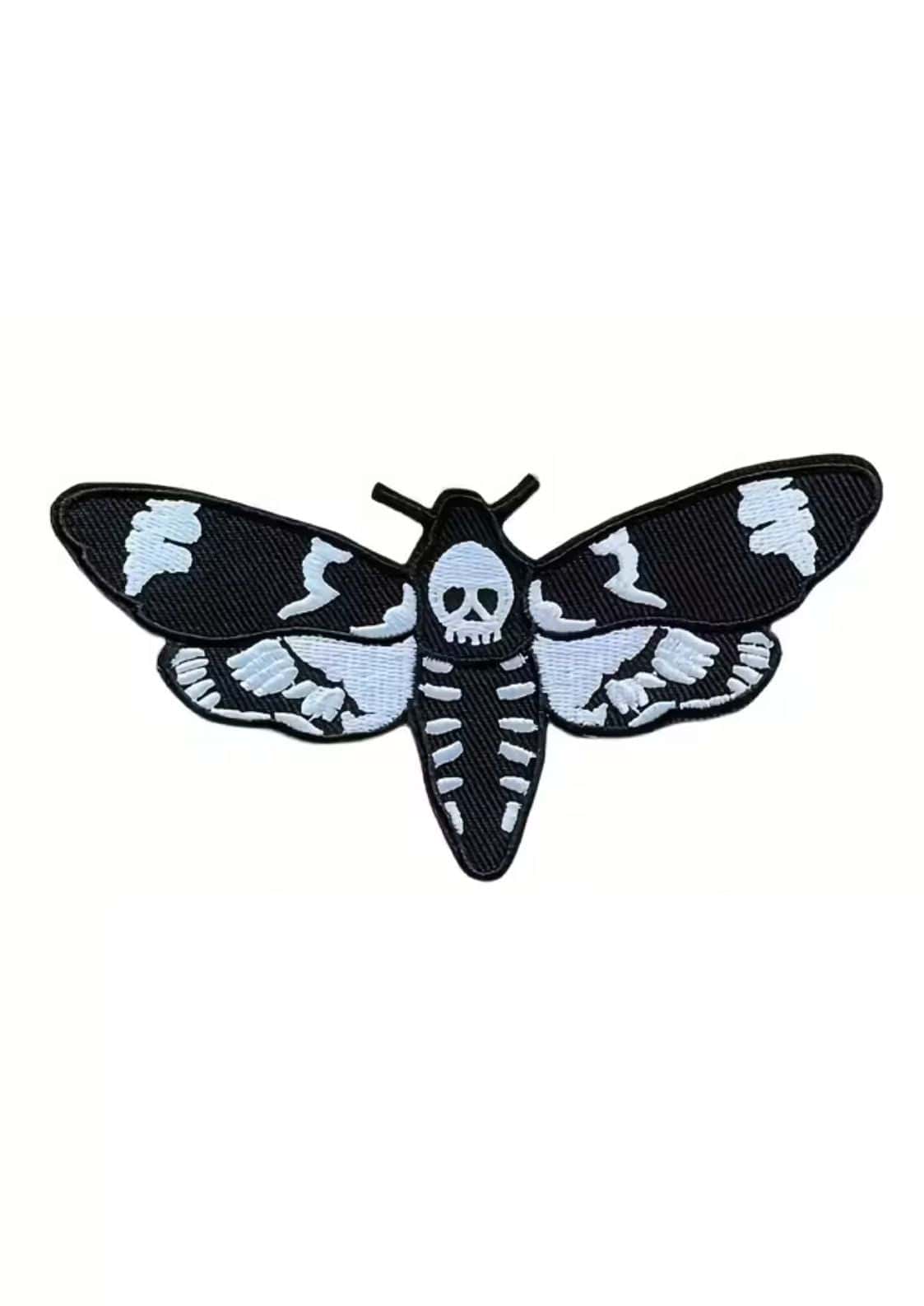 Black and white embroidered skull moth patch with gothic horror skull and ribcage design for clothing