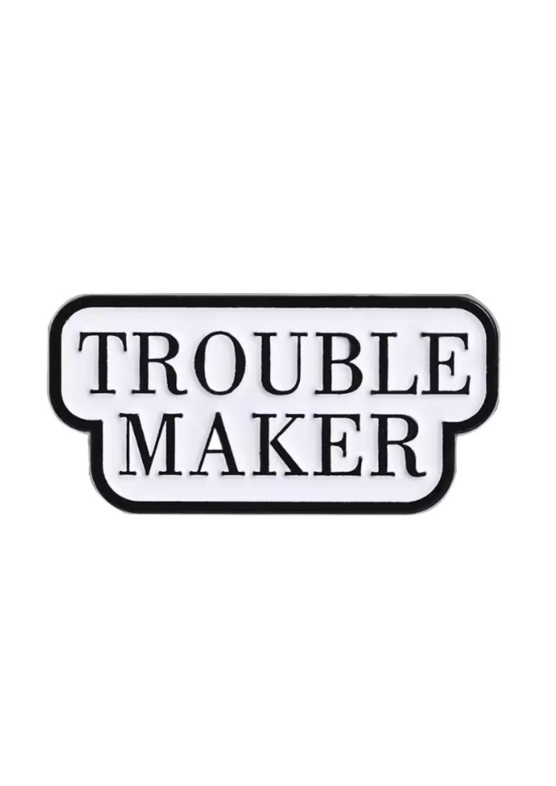 Schwarz-weißes ’Unruhestifter’-Emaille-Anstecker