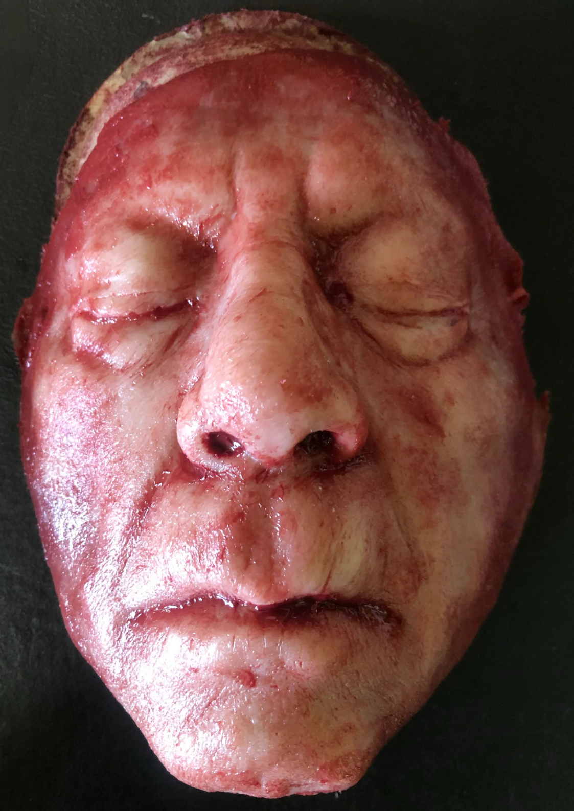 SKINNED FACE OF AN OLD MAN - FX