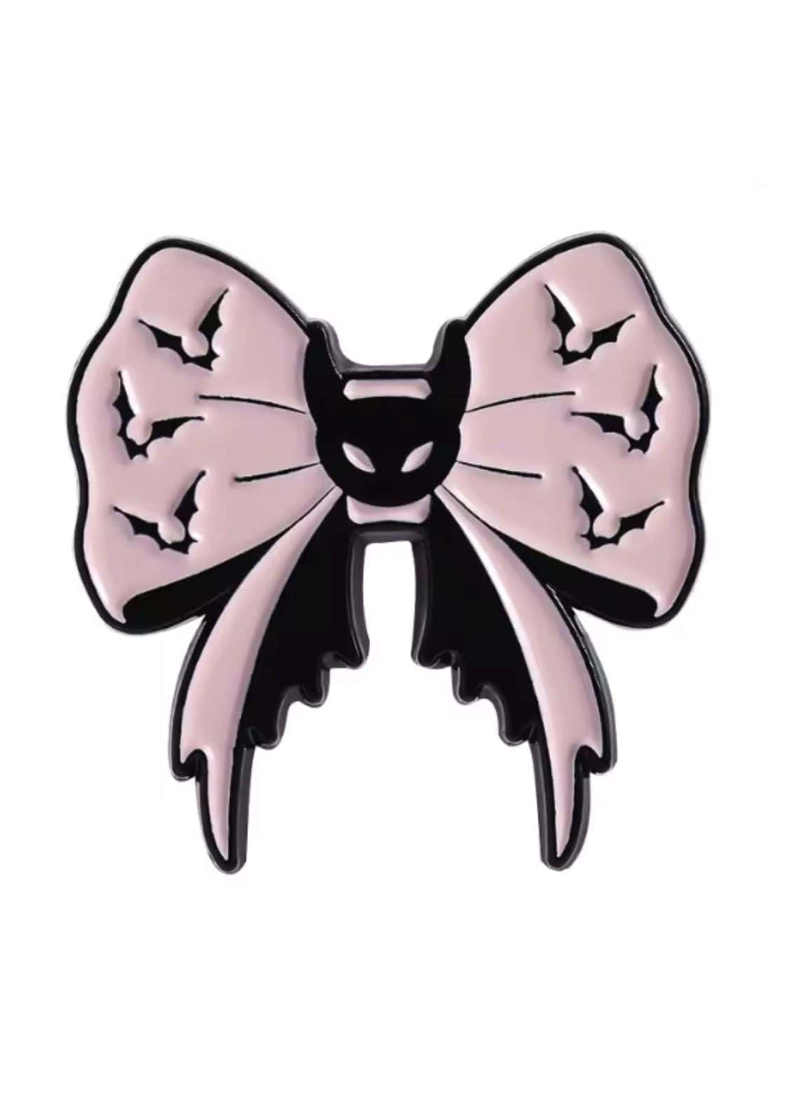 Rosa und schwarz emaillierte Anstecknadel in Form einer Schleife mit Fledermausmotiven.