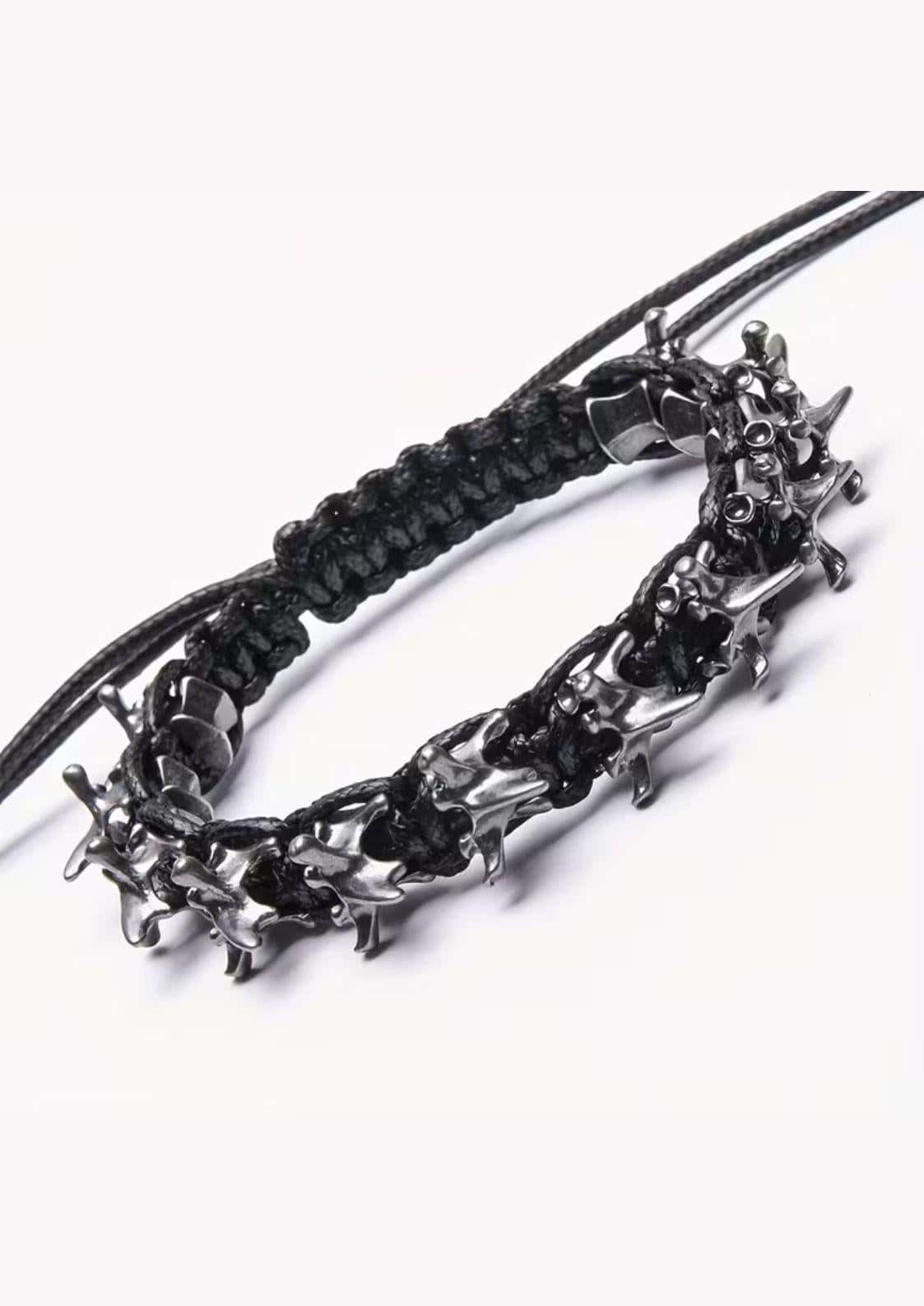Bio spine gothic armband aus schwarzem geflochtenem band mit silberfarbenem edelstahl fashion wirbelsäulen-design