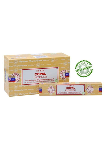 Beige kartonverpackung der satya copal räucherstäbchen mit roter und weißer etikettierung für gothic und horror fans