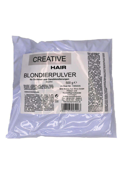 Eine durchsichtige plastikverpackung mit 500g creative hair blondierpulver blau für neutralisation warmer töne und alternative looks