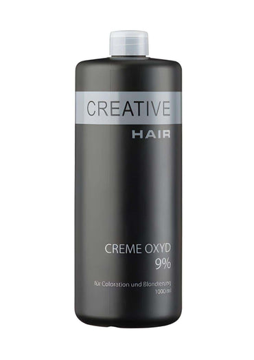 Eine schwarze kreative haar creme oxyd 9% haarentwickler flasche mit klarem deckel und silbernem etikett