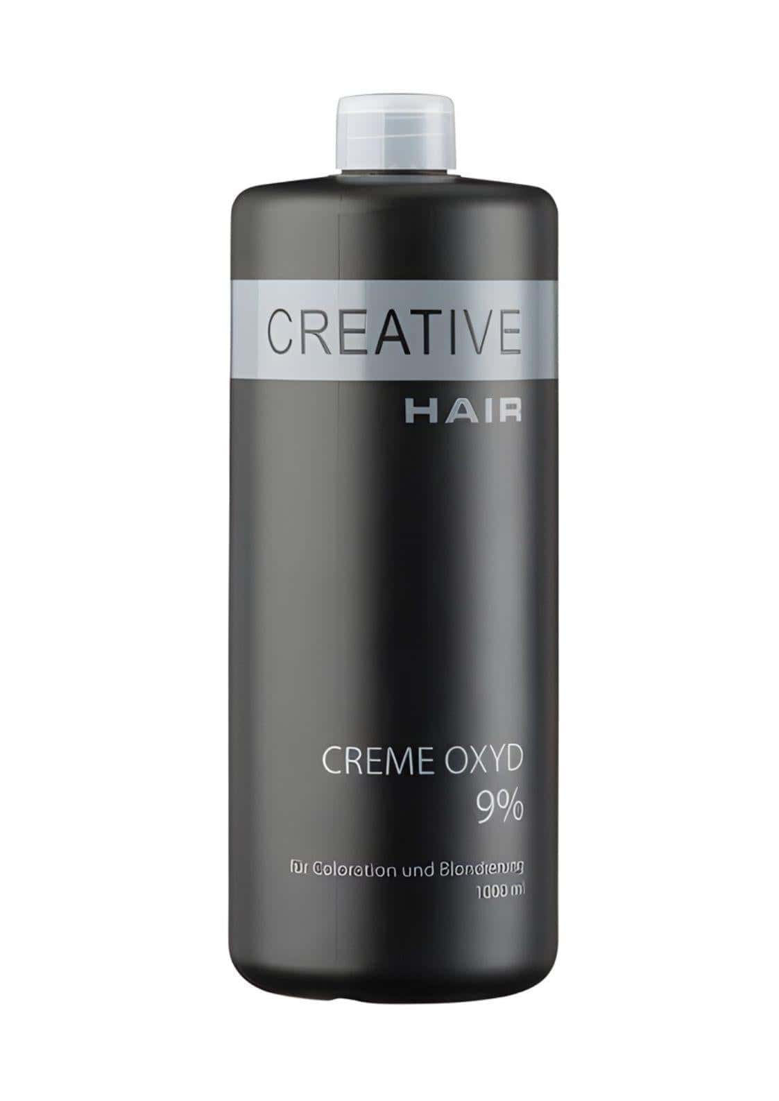 Eine schwarze kreative haar creme oxyd 9% haarentwickler flasche mit klarem deckel und silbernem etikett