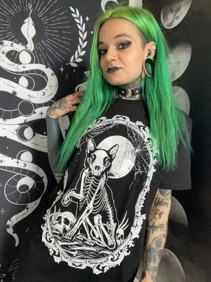 Black t-shirt with gothic white skeleton cat graphic under a full moon framed by skulls for horror fans