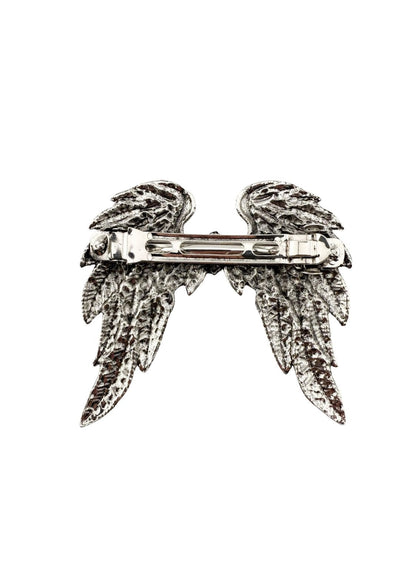 Silberner Engel-Flügel-Haarclip mit aufwendigen Feder-Details und metallischem Finish.