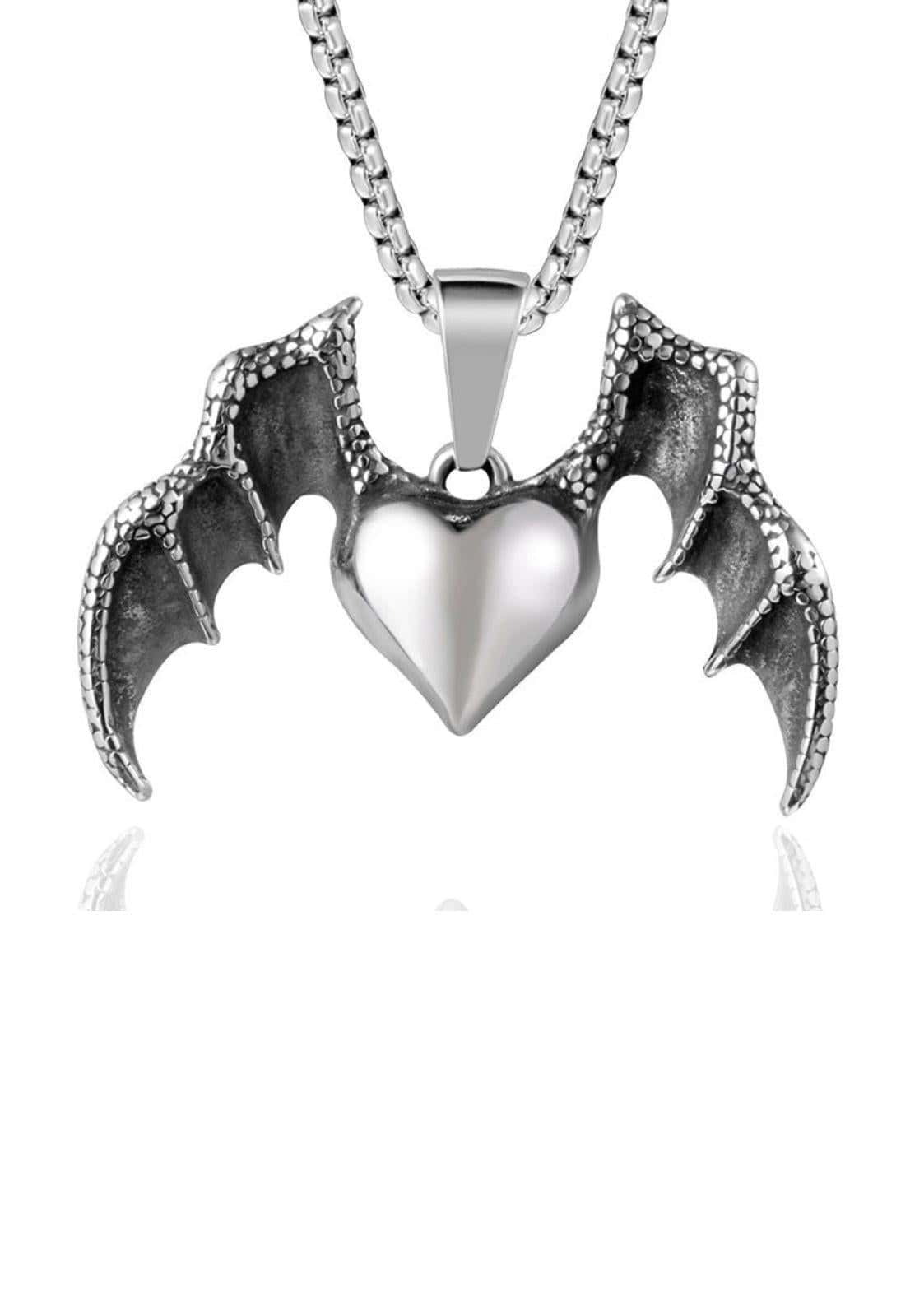 Silberne dragons heart halskette mit herzförmigem anhänger und detaillierten schädel offener mund flügeln für dunkle ästhetik