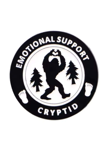 Rundes schwarz-weißes Abzeichen ’Emotional Support Cryptid’.