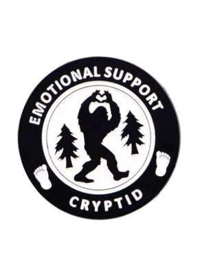 Rundes schwarz-weißes Abzeichen ’Emotional Support Cryptid’.