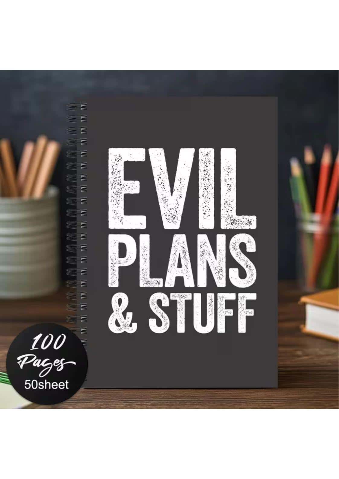 Schwarzes spiralnotizbuch mit weißem distressed text evil plans & stuff für gothic und horror fans