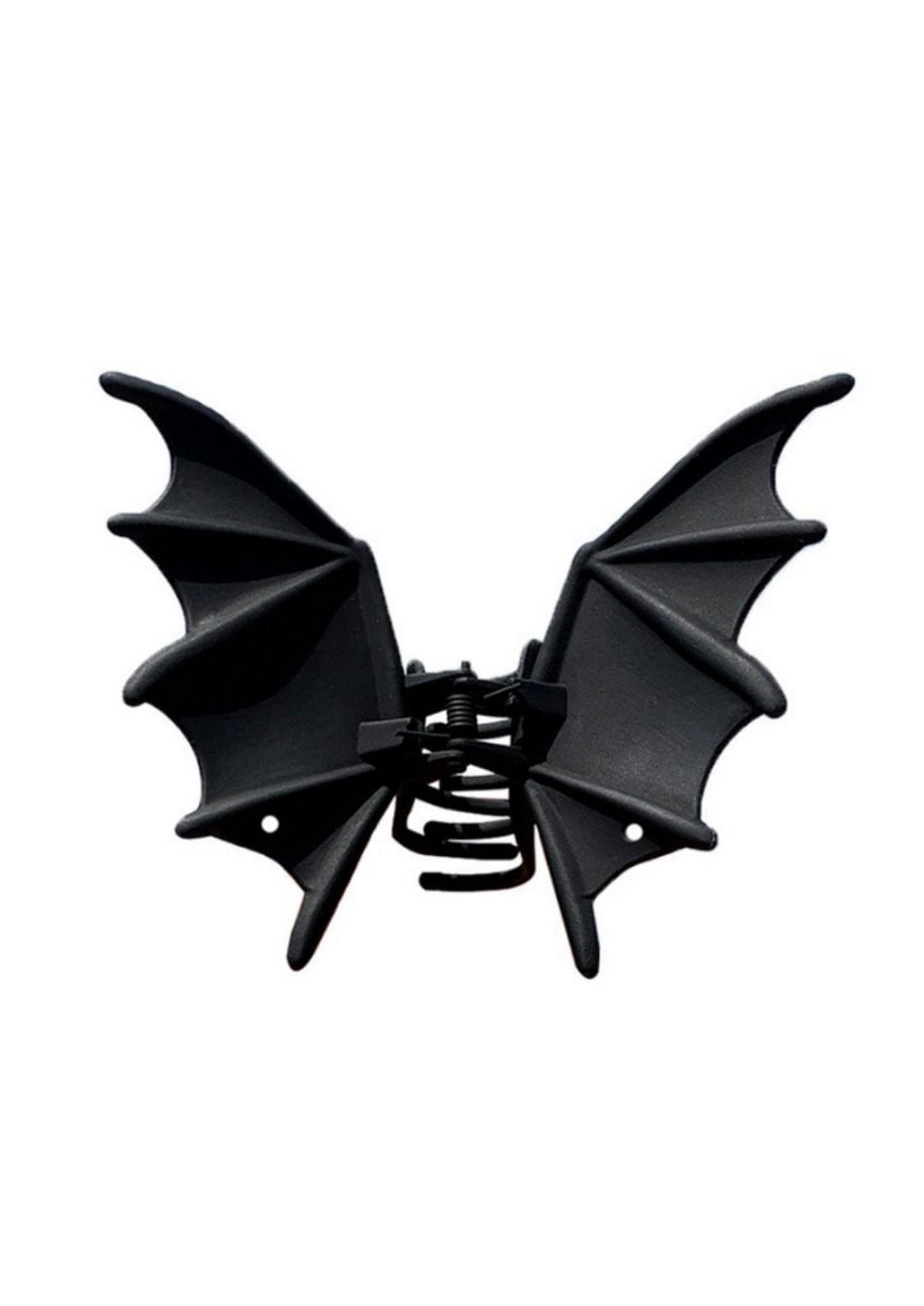 Schwarze Fledermausflügel-Haarspange mit Feder-Mechanismus und mehrlagigem Design.