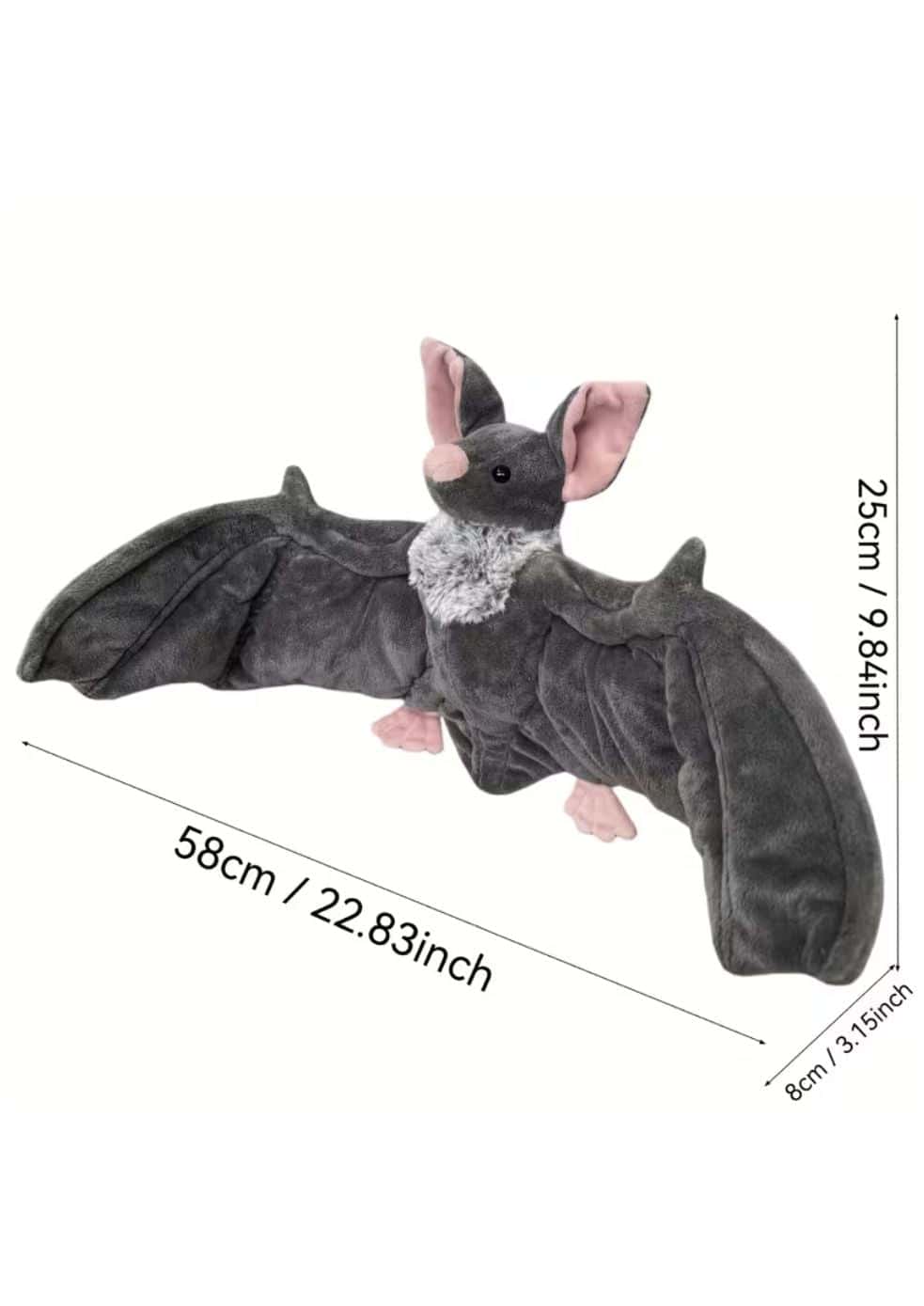 Fledermaus plüschtier mit dunkelgrauen velourflügeln, rosa ohren und füßen, weißer brust und gothic design