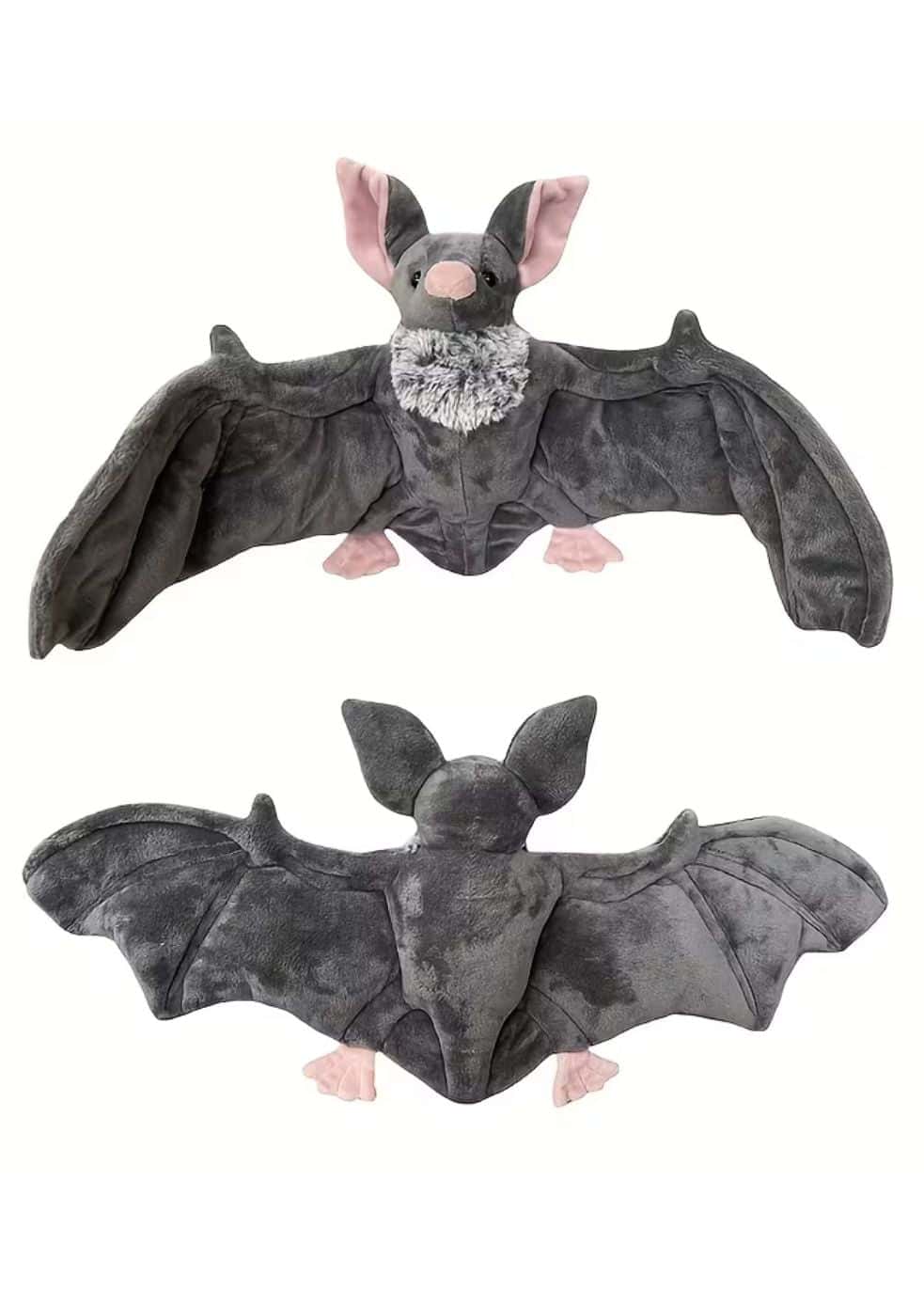 Plüschtier fledermaus grau mit rosa ohren und weißen rüschen im gothic stil als kuscheltier