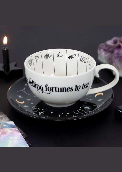 Weiße einzigartige teetasse aus keramik mit wahrsage- und astrologische symbole und astrologischen symbolen verziert