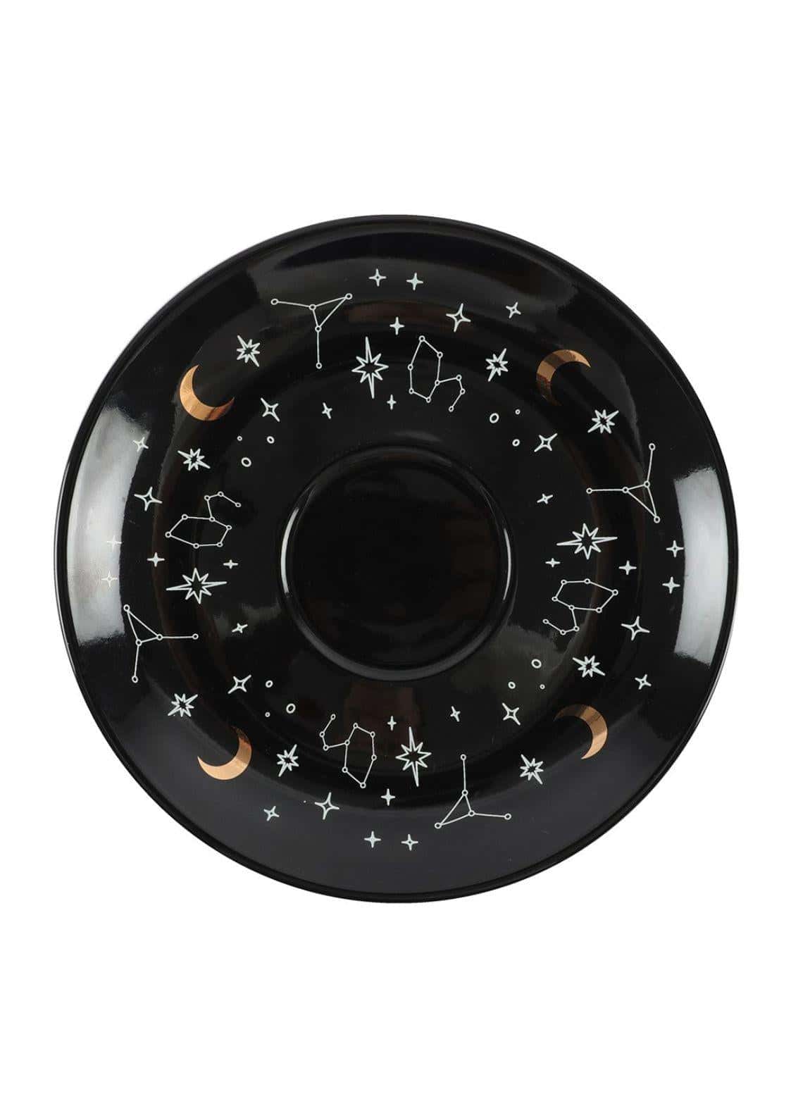 Einzigartige teetasse mit schwarzem keramikuntersetzer verziert mit weißen und goldenen wahrsage- und astrologischen symbolen