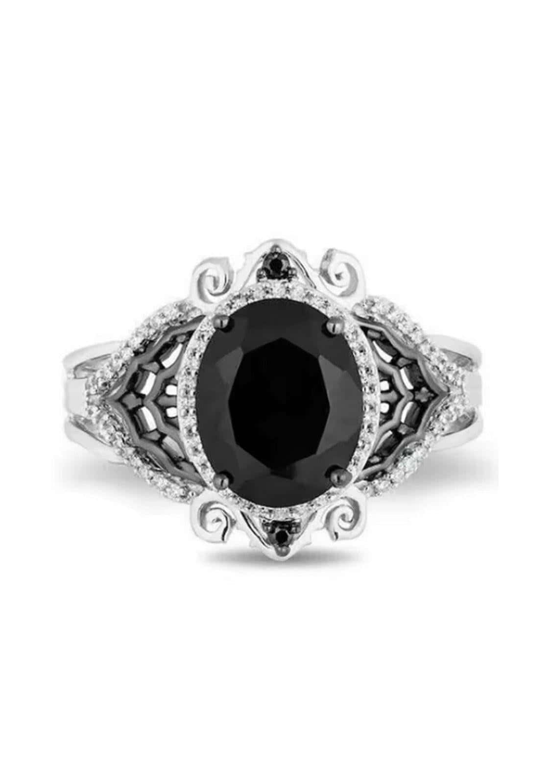 Eleganter glitter gothic ring mit markantem glanz durch ovalen schwarzen diamant und filigrane weißdiamanten