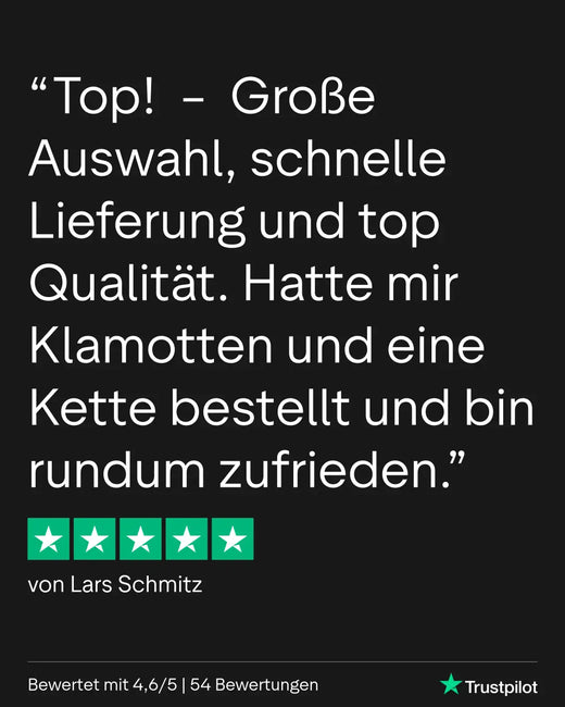 Goldkette mit schwarzen Gliedern und silbernen Akzenten