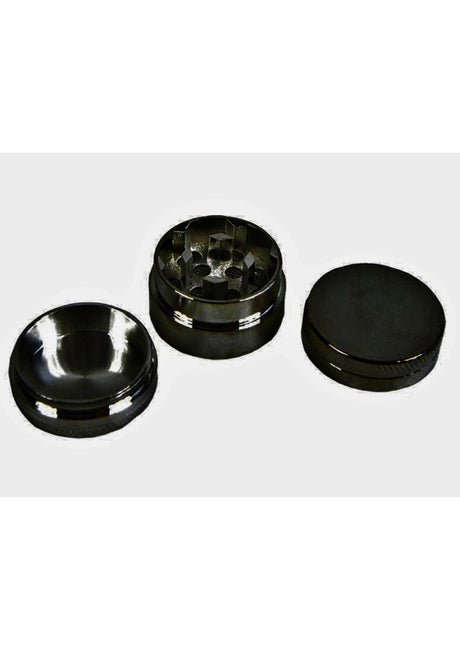 Schwarzer Metall-Kräutergrinder.