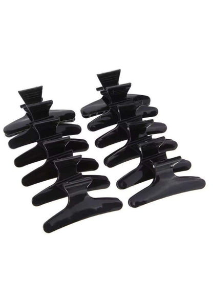 Set aus zehn glänzenden schwarzen plastik-haarklammern mit glatten kanten für kreative looks und zuverlässiges friseurzubehör
