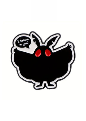 Schwarzes Plüschtier mit roten Augen und Sprechblase mit der Aufschrift ’Ich glaube an dich!’.