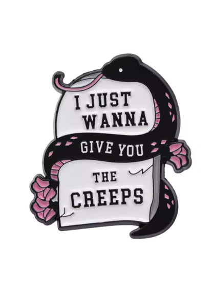 Schwarzer Schlangenenamelpin mit rosa Blumen und Text »Ich möchte dir nur Angst machen«