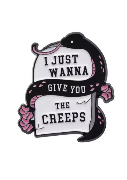 Schwarzer Schlangenenamelpin mit rosa Blumen und Text »Ich möchte dir nur Angst machen«