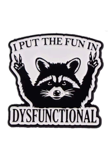 Raccoon pin with peace signs and the text i put the fun in dysfunctional in black and white design