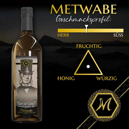 Eine klare glasflasche metwabe earl grey teewein mit schwarzem deckel und etikett zur englischen tea-time zelebrieren
