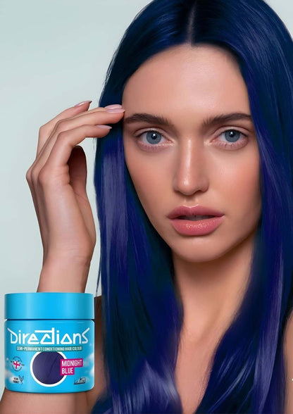 Eine sleek zylindrische dose mit midnight blue directions 100ml haartönung in tiefes nachtblau und pflegeformel für natürliches haar