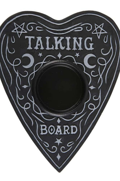 Schwarzes herzförmiges ouija board tealight mit silbernen gravuren als kerzenständer