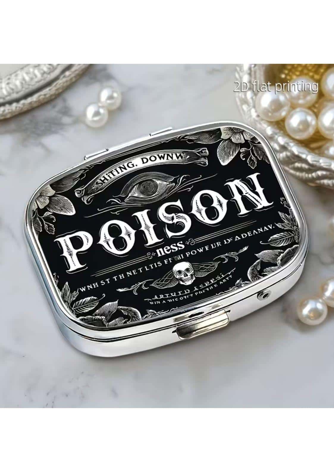 Silberne rechteckige taschenspiegel mit schwarzem gothic-deckel und weißen augen, schädel und blattmotiven für dark fashion