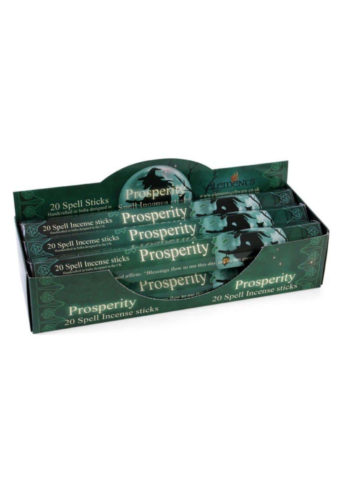 Grüner karton display mit mehreren packs prosperity elements räucherstäbchen für harmonische atmosphäre und innere balance