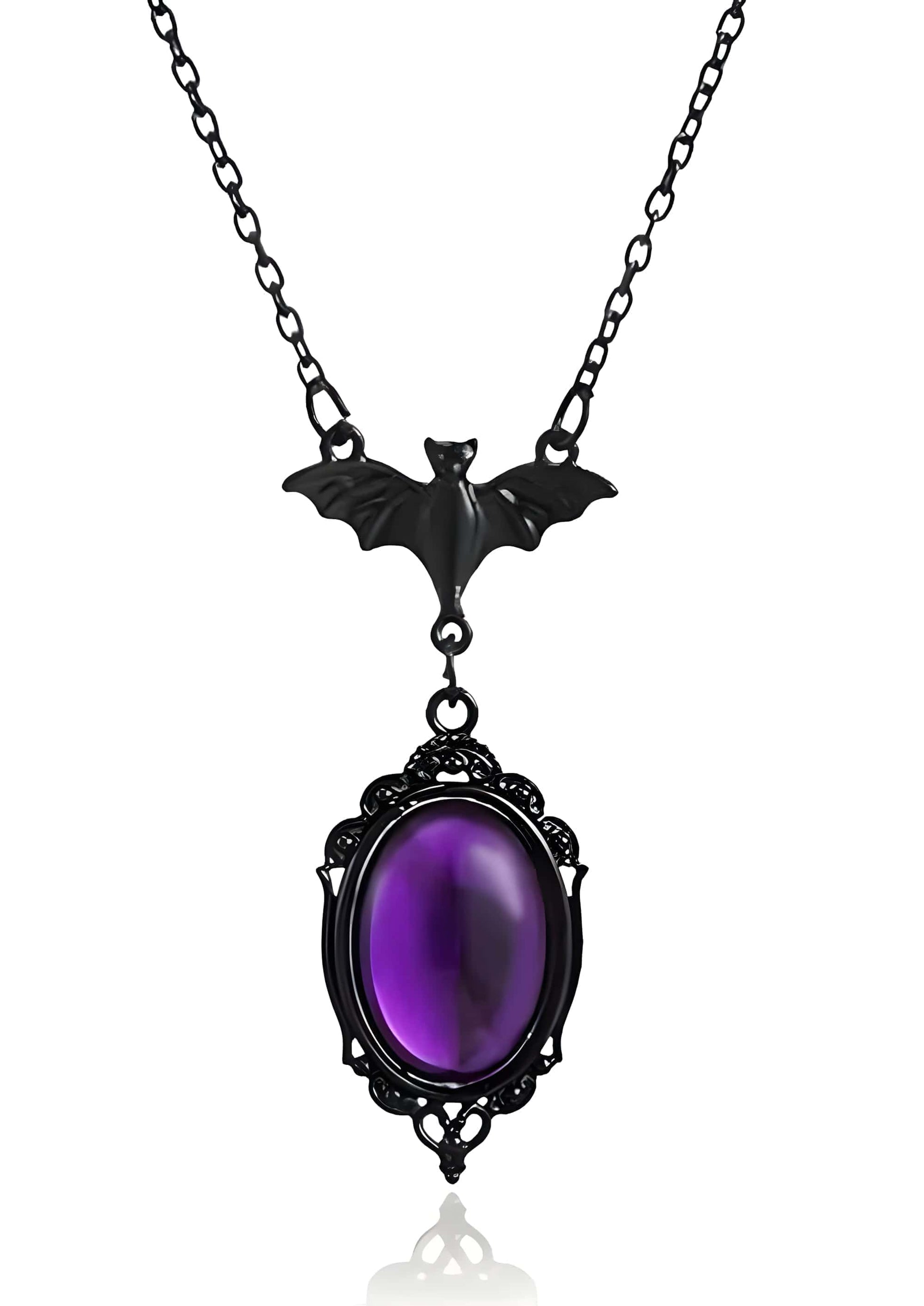 Schwarze gothic halskette mit fledermausanhänger und ovalem violettem cabochonstein in kunstvollem metallrahmen