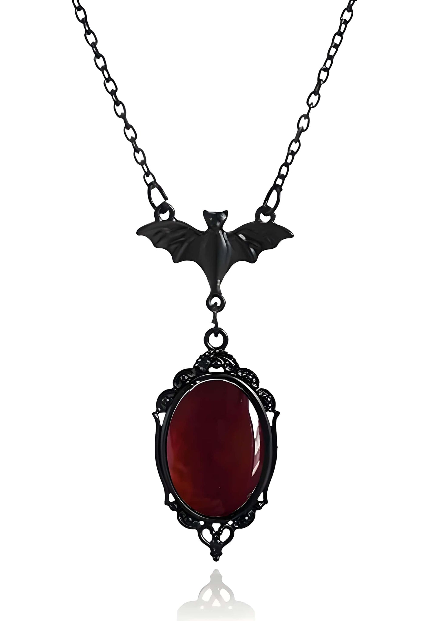 Schwarze gothic halskette mit bat-motiv und großem rotem stein in ornamentaler metallfassung für dark fashion
