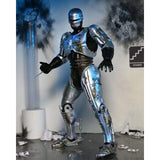 ROBOCOP DAMAGED BATTLE WITH CHAIR ULTIMATE 18CM - FIGURE