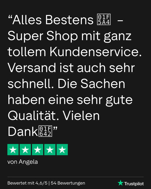 Schwarze Lederbrieftasche mit goldenen Beschlägen und grünen Akzenten.