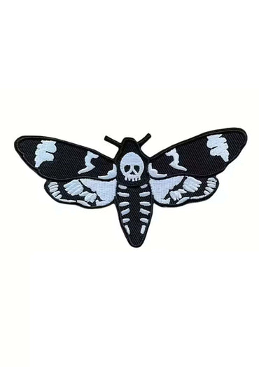 Black and white embroidered skull moth patch with gothic horror skull and ribcage design for clothing