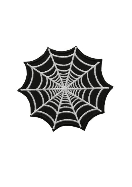 Schwarzer und weißer Spinnennetz-Fleck.