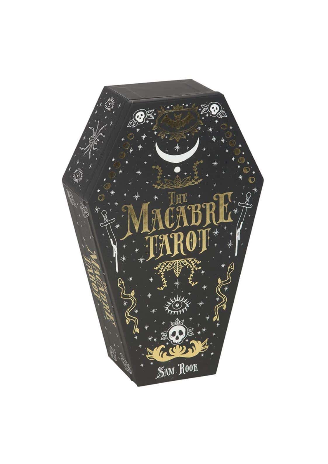 Schwarze sargförmige box mit goldfolienverzierung und schädeln für the macabre tarot tarotkarten
