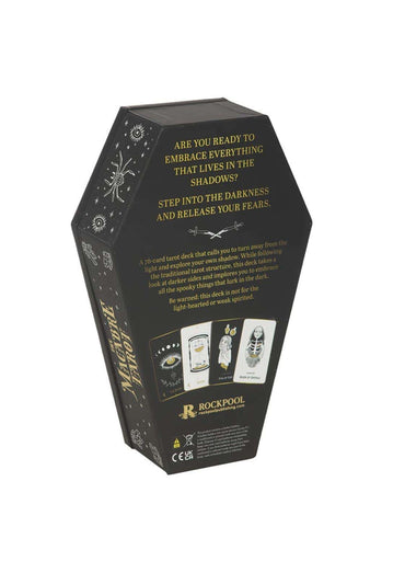 Schwarze schachtel in sargform mit goldfolienbeschriftung und weißen himmelssymbolen für the macabre tarot von rockpool