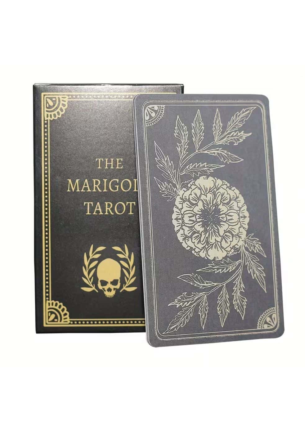 The marigold tarot tarotkarten box features dark gray cards with white floral designs and gold foil accents with skull emblem