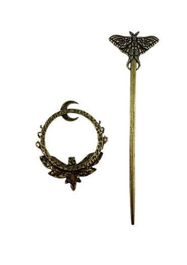 Antike haarnadel in messing mit gothischem makro-motiv und mond im blätterdesign für gothic kleidung