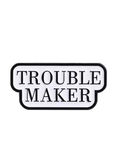 Schwarz-weißes ’Unruhestifter’-Emaille-Anstecker
