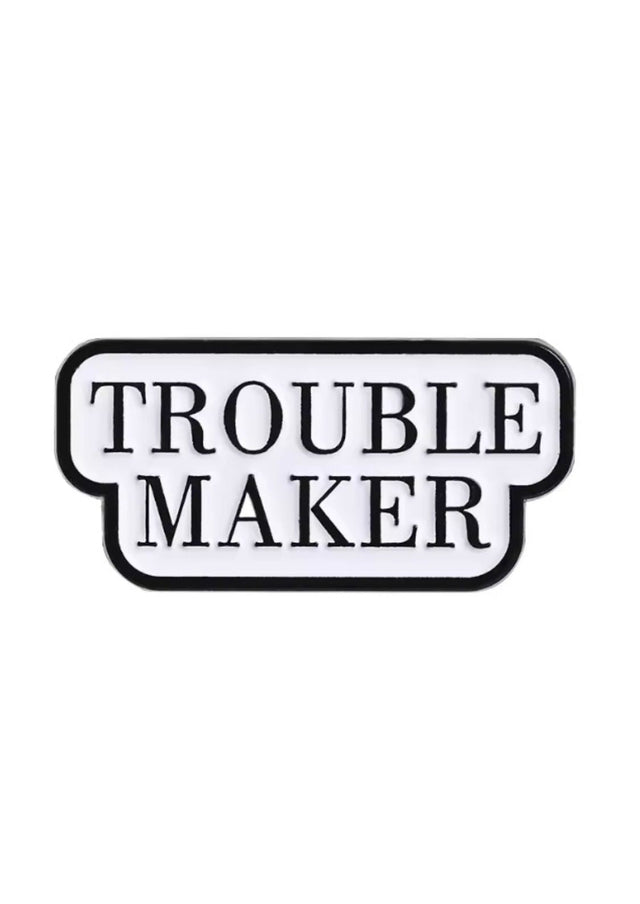 Schwarz-weißes ’Unruhestifter’-Emaille-Anstecker