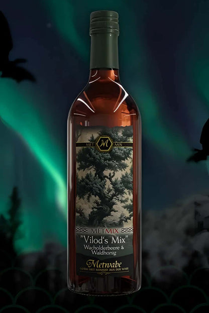 A bottle of vilod´s gothic horror metmix wine with dark green cap amber liquid and intricate tree label